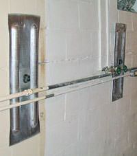 A foundation wall anchor system used to repair a basement wall in Agawam