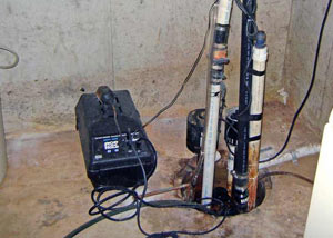 Pedestal sump pump system installed in a home in Greenfield